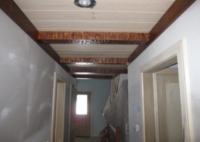 Powell - Removed Soffit in Hall Ceiling and Installed Tongue and Groove Ceilings with Beams