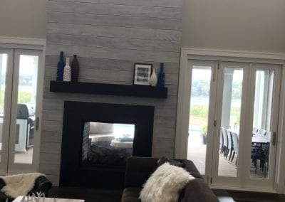 Buckeye Lake - Living Room Featuring See-through Fireplace to Patio